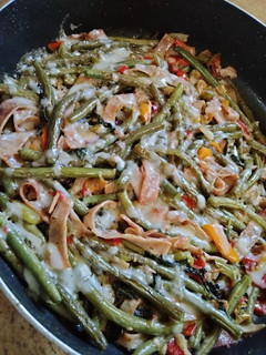 A picture of Fried Green Beans with Ham & Radish Greens.