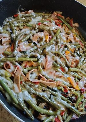 A picture of Fried Green Beans with Ham & Radish Greens.