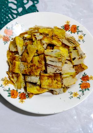 Una foto de Pajeon a la lucecita - tortilla de cebolla