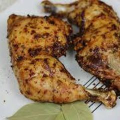 A picture of This is grilled chicken with frying pan without oven.