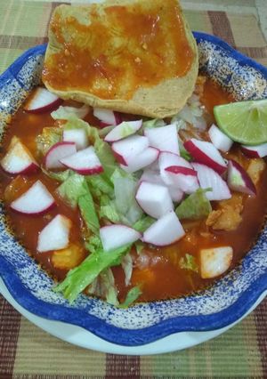 A picture of Pozole with Pork Shank.