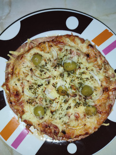 Una foto de Pizza con base de tortita de trigo en freidora de aire