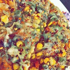 A picture of Cheese corn pizza.