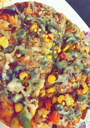 A picture of Cheese corn pizza.