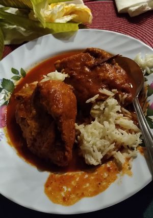 Una foto de Patitas de puerco capeadas en salsa roja