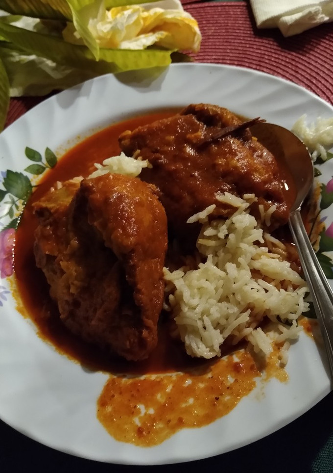 Una foto de Patitas de puerco capeadas en salsa roja