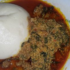 A picture of Semo and egusi soup.