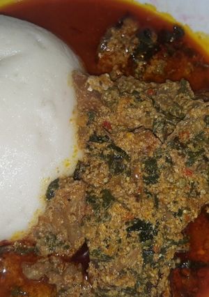 A picture of Semo and egusi soup.