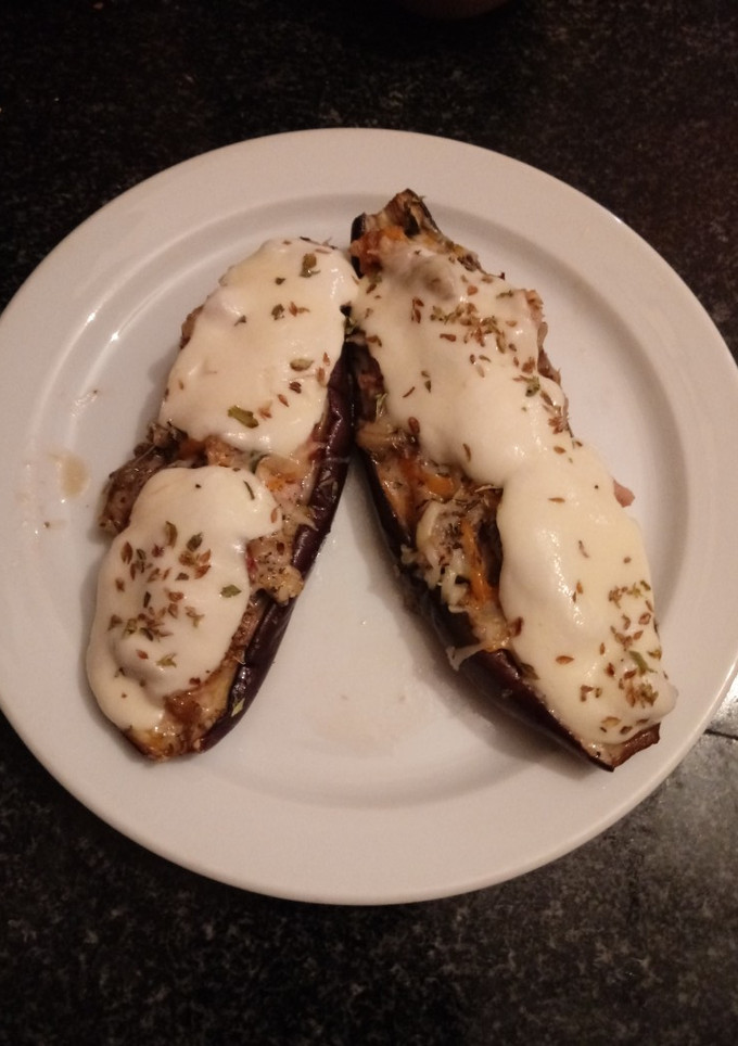 Una foto de Berejena rellena estilo pizza de aprovechamiento