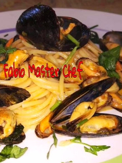 Foto di Spaghetti con Cozze, Pomodorini Freschi e Zafferano