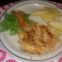 A picture of Roasted chicken with chips.