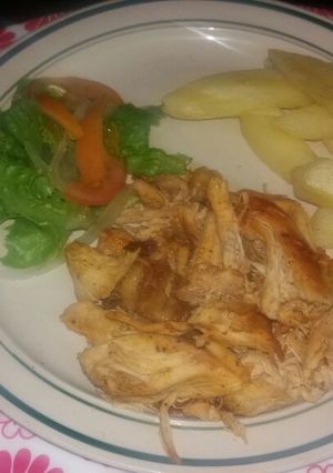 A picture of Roasted chicken with chips.