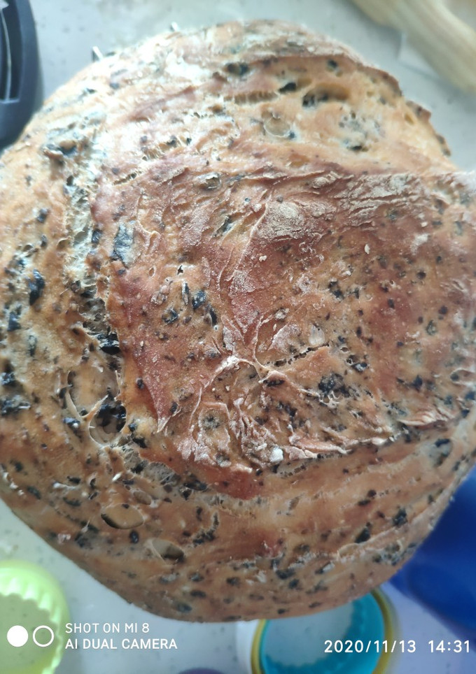 Una foto de Pan de aceitunas negras en mambo