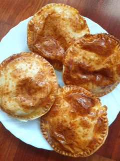 Una foto de Empanadillas de calabacín y cebolla