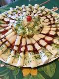 Salade de concombres, tomates, coeurs de palmier au persil et crème de balsamique