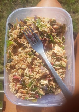 A picture of Tofu, egg and veg fried rice.