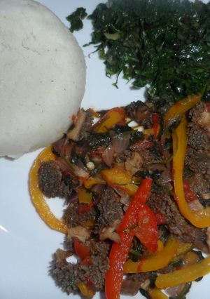 A picture of Matumbo (tripes) served with ugali and spinach.
