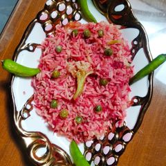 A picture of Beetroot vegetable pulao.