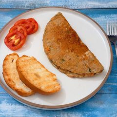A picture of Veggie Loaded Masala Omelette.