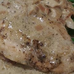 A picture of Chicken in a White Wine Sauce.