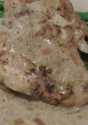 A picture of Chicken in a White Wine Sauce.