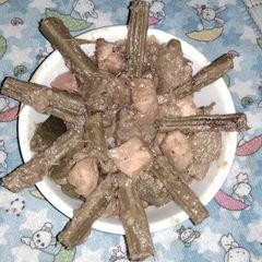 A picture of Paneer with drum stick.
