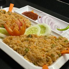 A picture of Veg Schezwan Fried Rice.