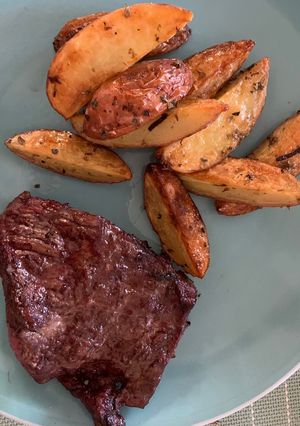 Una foto de Papas rústicas