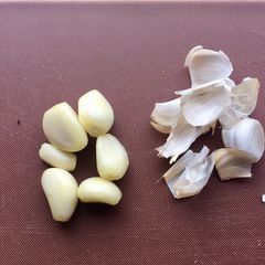 A picture of Trick: How to peel a garlic (so your hands don’t smell of it).