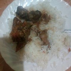 A picture of Rice and beef stew.