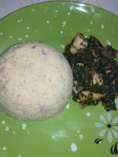 A picture of Tuwon Couscous and vegetable sauce.