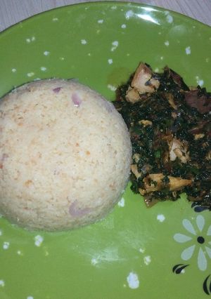 A picture of Tuwon Couscous and vegetable sauce.