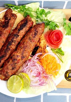 A picture of Turkish Chicken Adana Kabaabs In Oven And On Skillet.