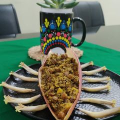 A picture of Mochar Ghonto (banana flower).