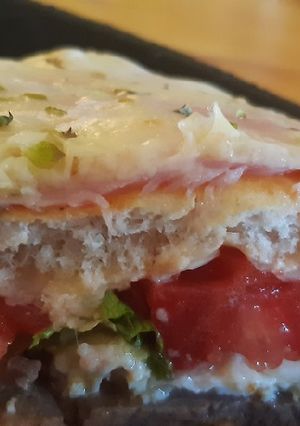 Una foto de Lomo pizza criminal