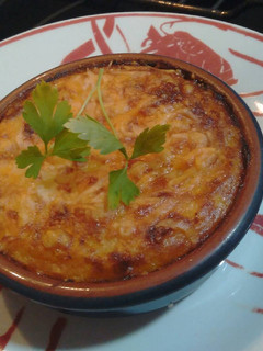 Una foto de Pastel de carne con sobrasada y parmentier gratinada