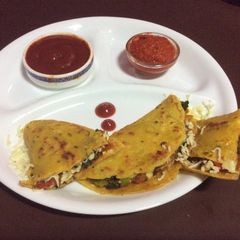 A picture of Vegetables stuffed besan chilla.