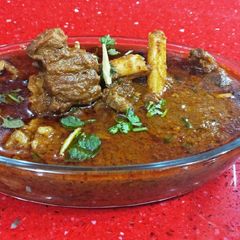 A picture of Mutton in apple gravy.