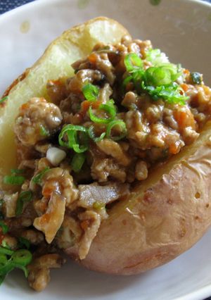 A picture of Jacket Potato With Spicy Miso Pork.
