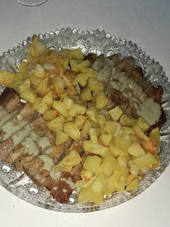 Una foto de Secreto ibérico con patatas al Cabrales