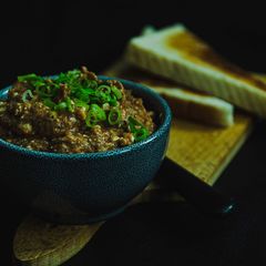 A picture of Bolognese-Feta Aubergine cream on Toast.