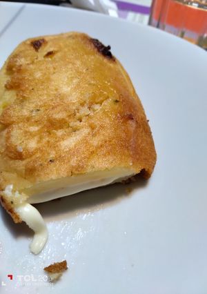 Una foto de Papa con queso
