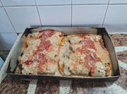 Una foto de canelones crema choclo