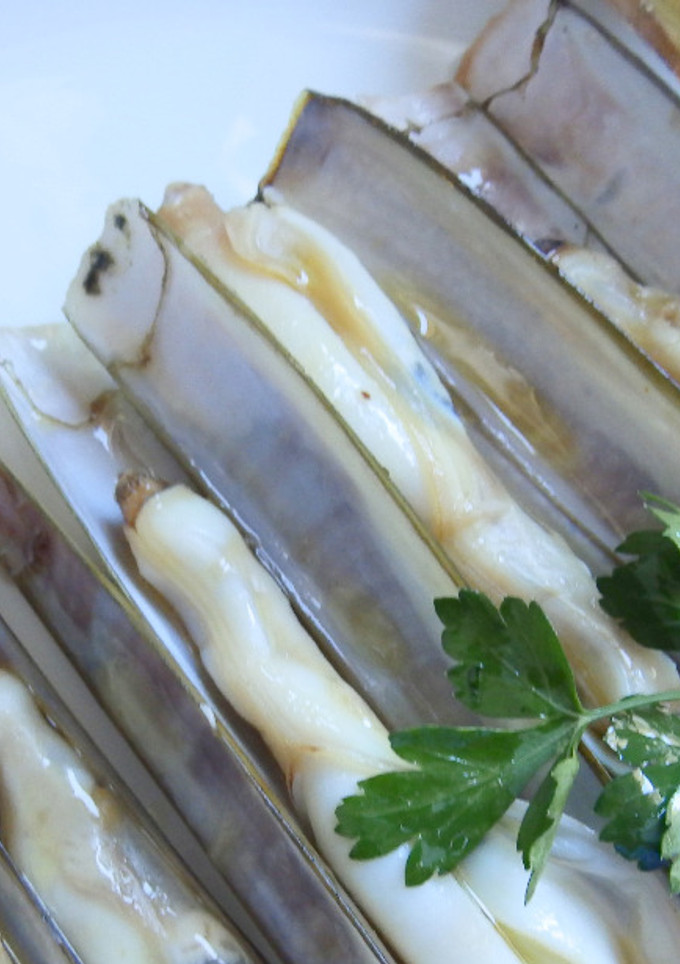 Una foto de Navajas flameadas al horno