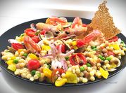 Una foto di calamari scampi