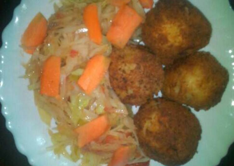 Potato fritters and fried cabbage