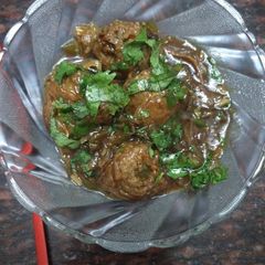 A picture of Leftover rice Manchurian jain/regular.