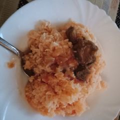 A picture of Fried Rice with Beef Stew.