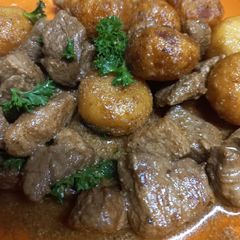 A picture of Marinated Pork and Gnocchi.