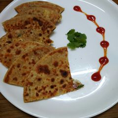 A picture of Delicious paneer paratha.